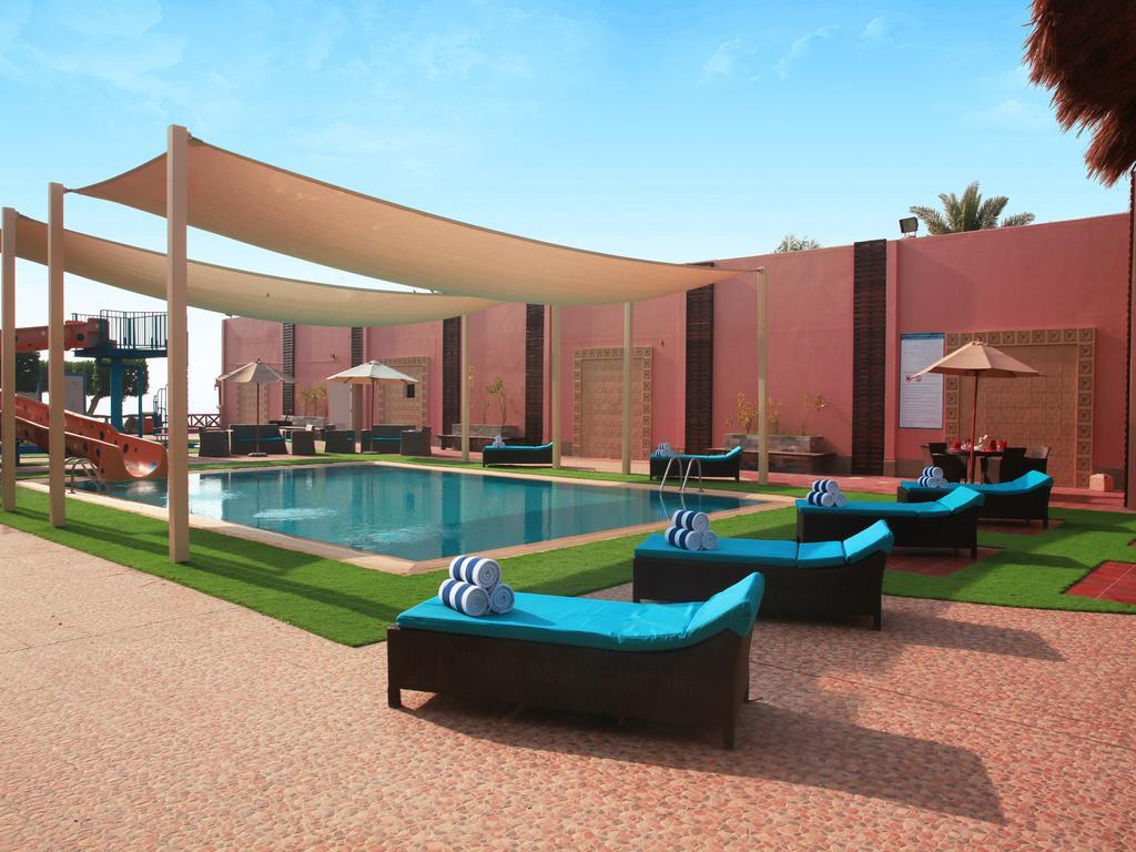 Dana Beach Resort Bahía de la Media Luna Exterior foto